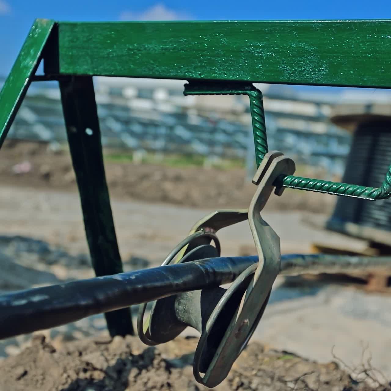 Engineering works in sunny day. Industrial equipment outdoors. Construction industry on the field.