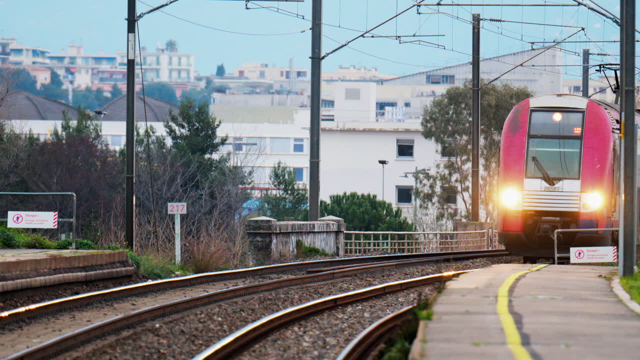 Nice, France - February 4, 2025: Trains moving on the rails in the Nice Ville Central train station