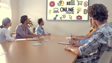 Team-of-executives-looking-at-the-presentation-in-the-conference-room