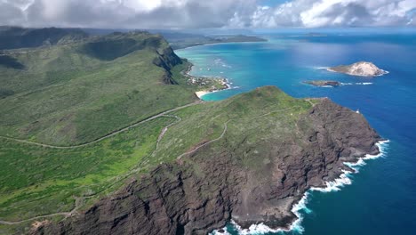 perilous beauty is showcased along hawaii's coast, defined by towering white waves and captivating volcanic rock formations