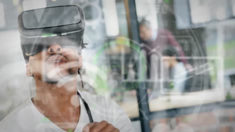 Animation of data processing and social media icons over african american man wearing vr headset
