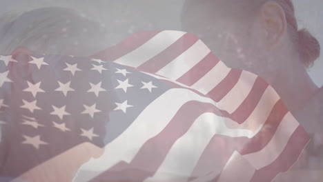 waving american flag over people with city skyline in background animation