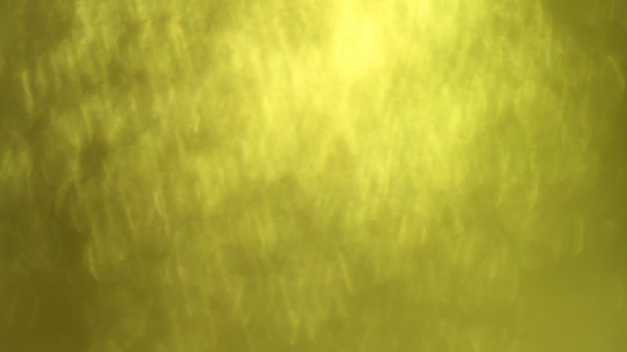 brillo dorado, fondo bokeh abstracto, elegante de polvo de navidad. partículas brillantes brillantes. movimiento de movimiento brillante ligero.