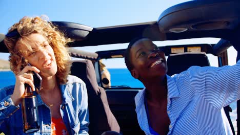 female friends having fun in the car 4k