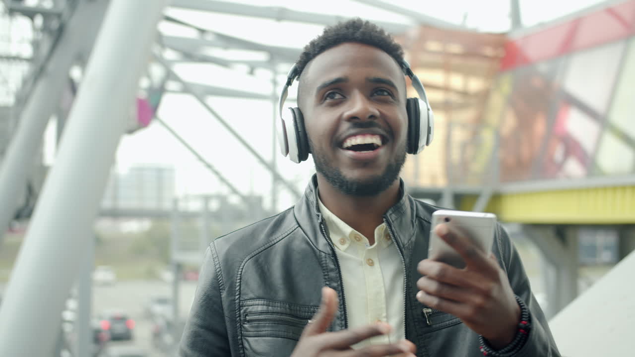 Man enjoying music outdoors