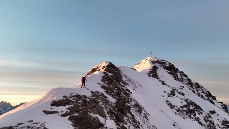 Mountaineer-is-climbing-a-mountain-with-the-skies-in-South-Tyrol