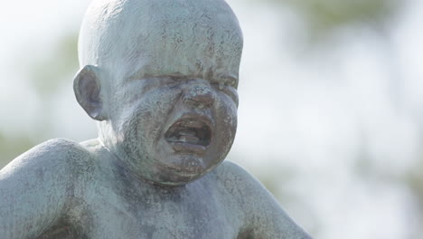 close up of the angry boy, gustav vigeland sculpture park, oslo