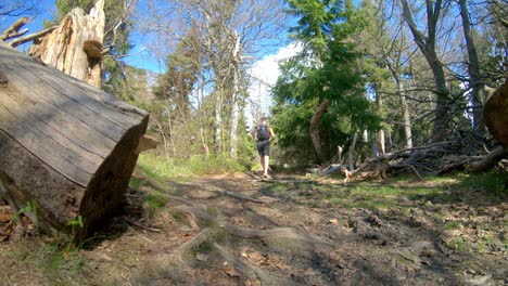 Slow-motion-trail-running-over-difficult-terrain