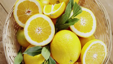 overhead of sweet limes in wicker basket