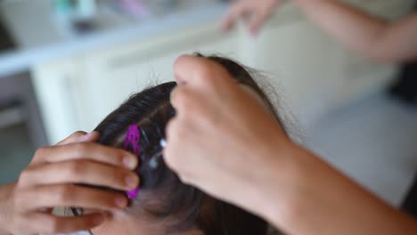 braiding a child's hair