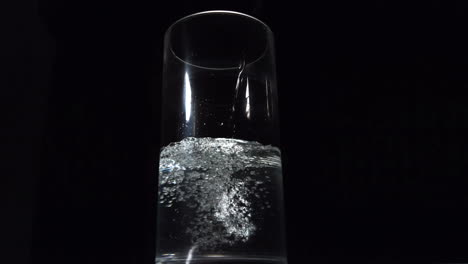 water being poured in a glass