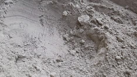 A-Closeup-shot-Pile-of-cement-powder,-Grady-cement-powder,-Heap-of-cement-powder-intended-for-industry,-Cement-or-mortar-cray