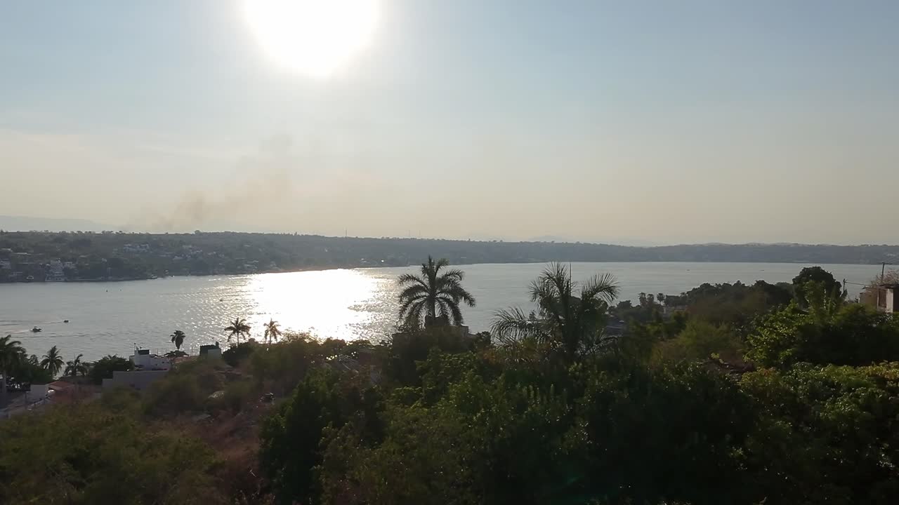 Drone footage, sunny sunrise Tequesquitengo Lake, Mexico