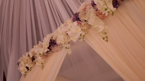 a line of flowers on the ceiling