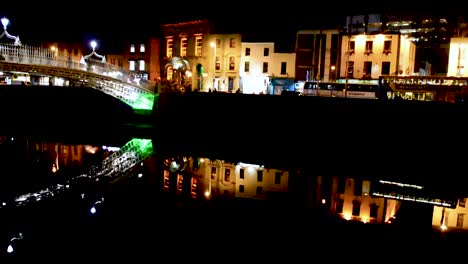 Night-view-of-the-South-Quays-towards-Templebar-in-Dublin-city-center-close-by-the-Halfpenny-Bridge