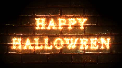 fiery happy halloween inscription with brick wall on background.