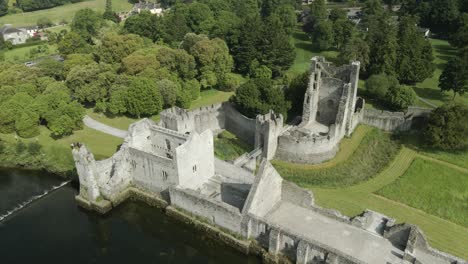 aerial view of desmond castle adare surrounded by green lush landscape in ashgrove, adare, county limerick, ireland