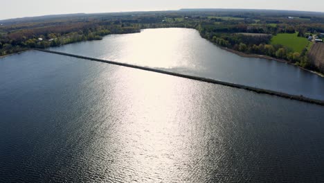 an overhead aerial shot of the mountsberg reservoir, which is located in puslinch, ontario