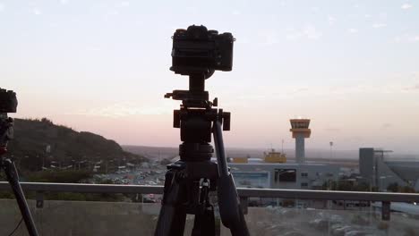 camera capturing curacao international airport when dusk is near