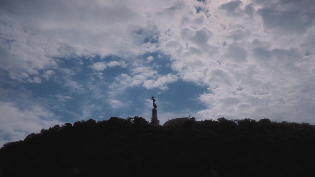 Silhouette of the Liberty Statue on Gellert Hill in Budapest