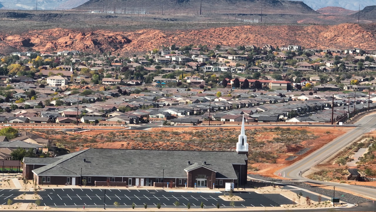 Aerial view of a church and a residential neighborhood, sunny day in Utah, USA
