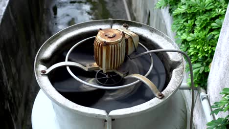 3 phase induction motor. the function is to drain or pump water. the exterior is old and rusty. over look.