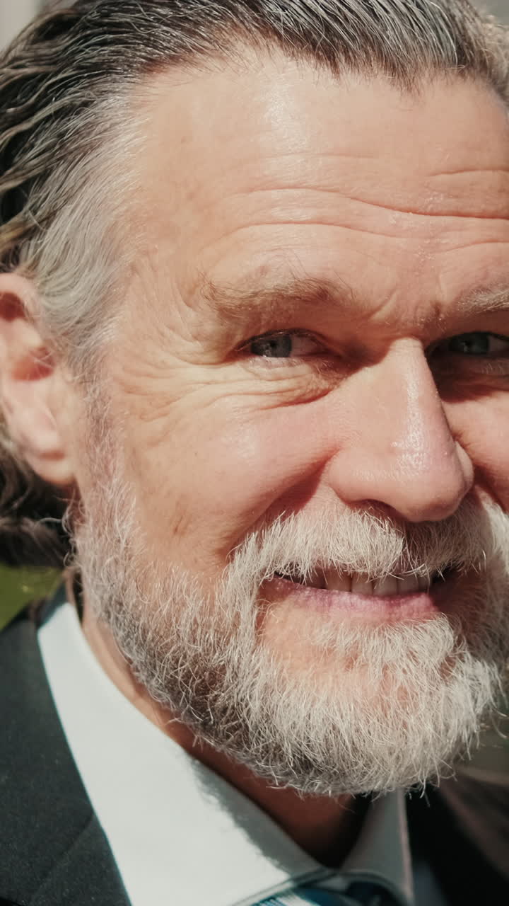 Confident Senior Businessman Enjoys Coffee Break