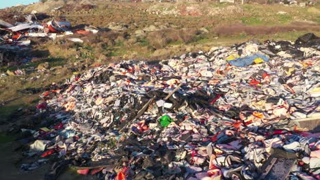 refugee lifejackets and rubber dinghy dumped lesvos island aerial