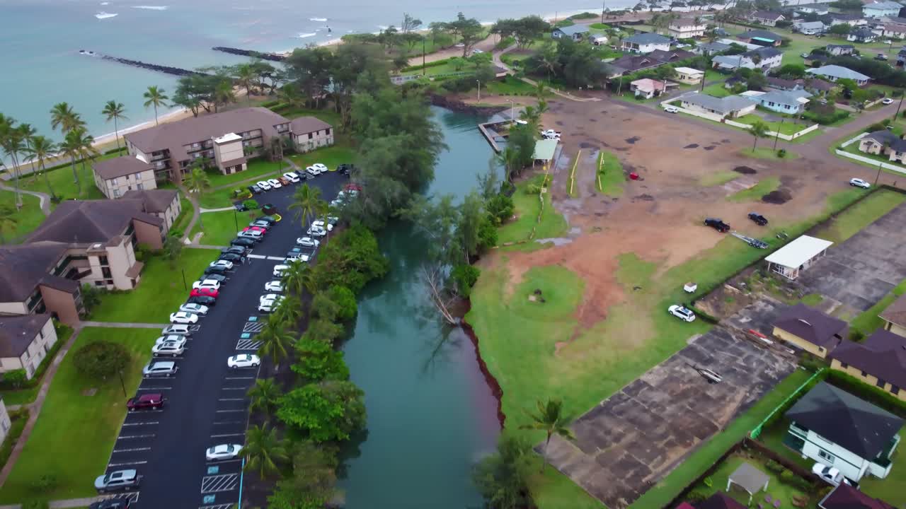 Aerial view of Waikea Boat Ramp near Waipouli Beach and Kapaa Beach Park, kuhio highway in Kappa Kauai Hawaii. beautiful beach with coconut palms in tropical island, Kauai Hawaii