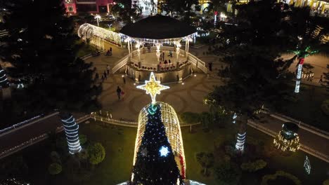 festive christmas atmosphere in quiosco de tuxpán with tourists gathering for holidays