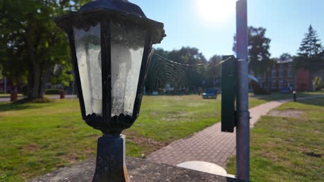 street lamp with spider webs close-up 4k 60fps slow motion