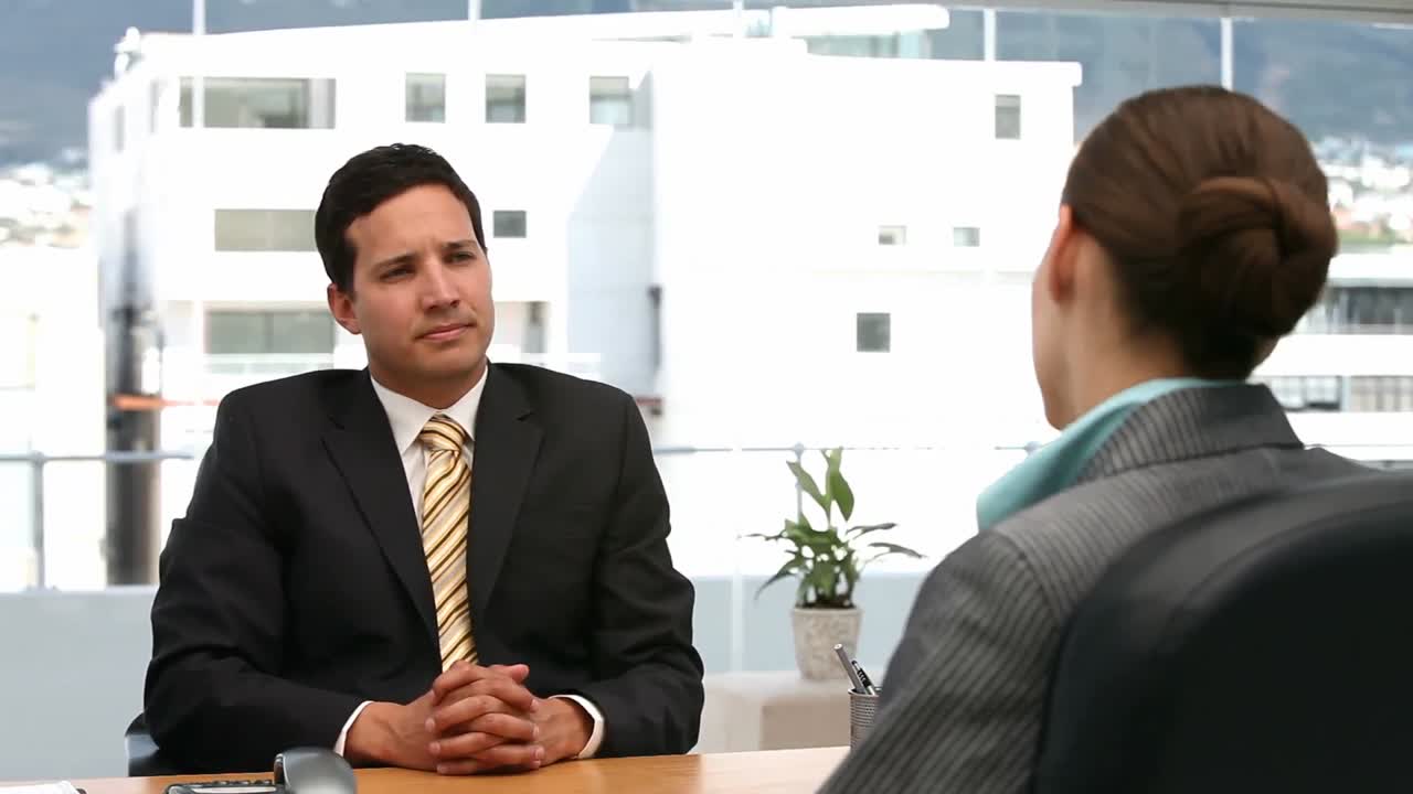 Interview between a businessman and a woman