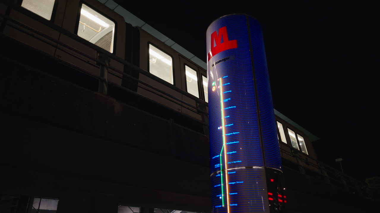 Vestamager Metro station sign in Copenhagen, Denmark at night