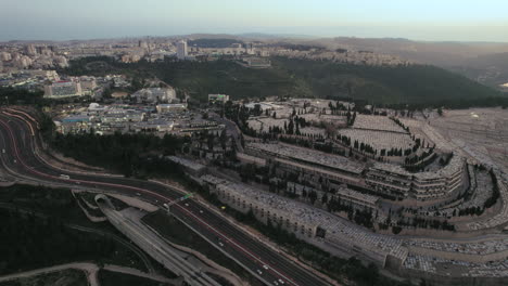 static shot over the entrance to jerusalem, israel and har hamenuchot cemetery