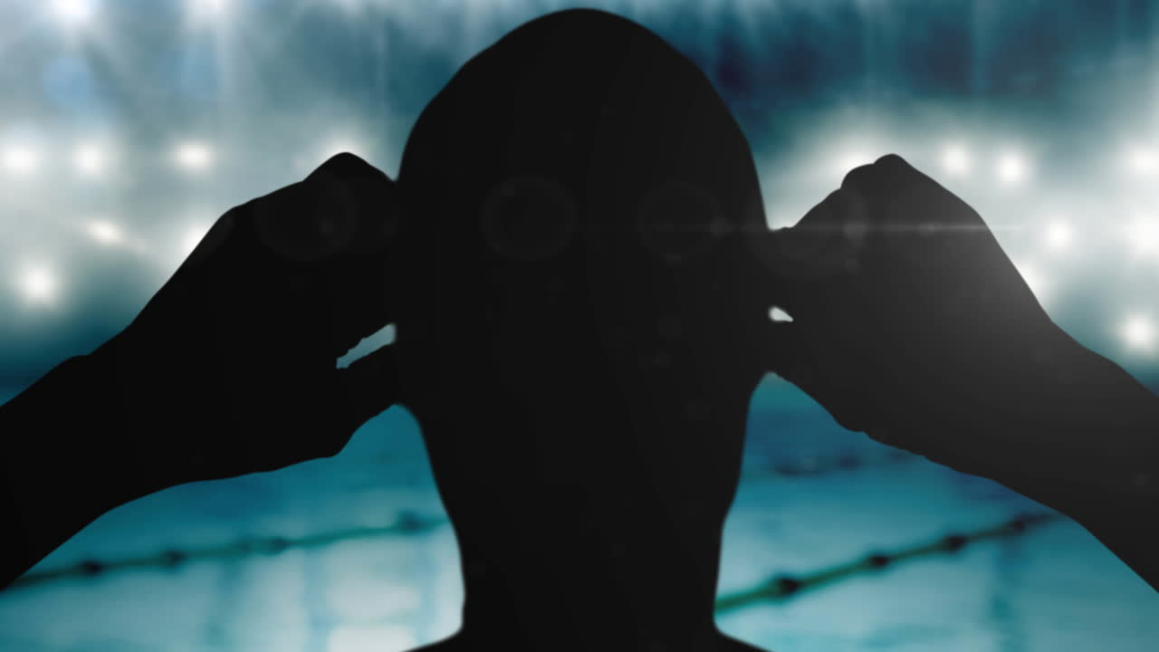 스포트라이트와 수영장 위의 수영 선수의 실루 ⁇ 의 애니메이션