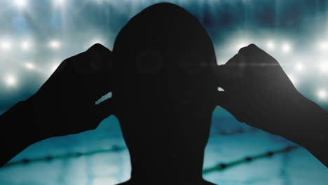 animación de la silueta del nadador sobre los reflectores y la piscina