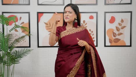 Indian-woman-pointing-downwards-product-space