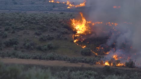 grassland fires, burning in the highlands of california, evening time in america