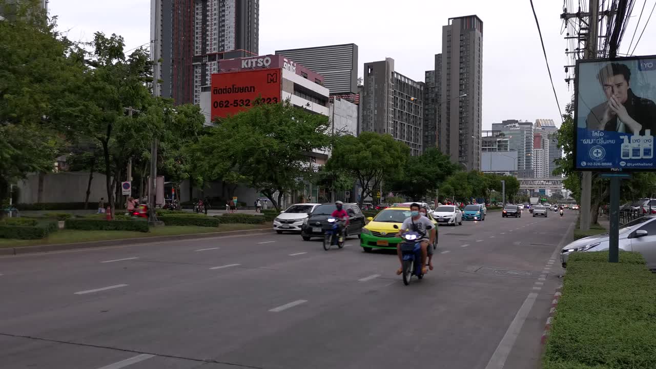 4K Vehicle Traffic Commuting Along Ratchadaphisek Road in Bangkok, Thailand.