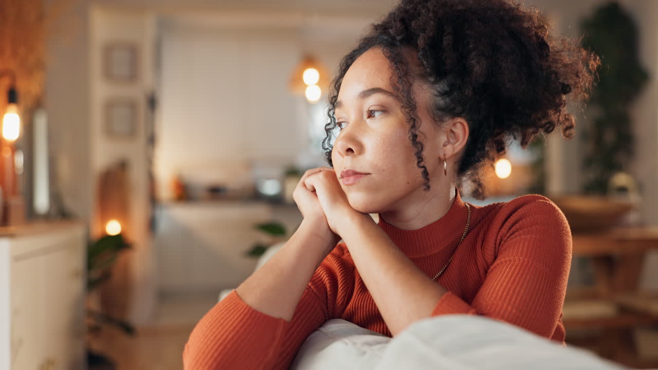 Woman Sitting Thoughtfully