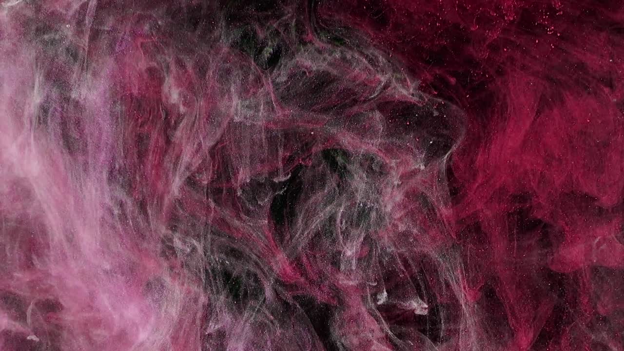 Abstraktní formy. Focení na černém pozadí. Míchání barev.