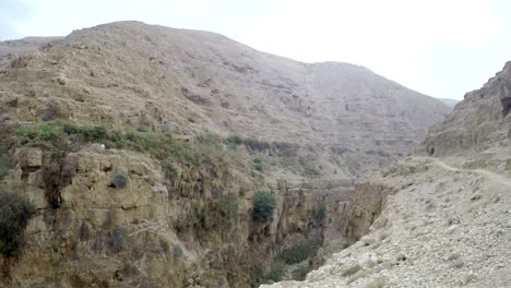 panorama of orthodox monastery of st. george of choziba, in wadi qelt, in the eastern west bank, jerusalem, israel, the wadi qelt or nahal prat, mountain area in the north of the judean desert