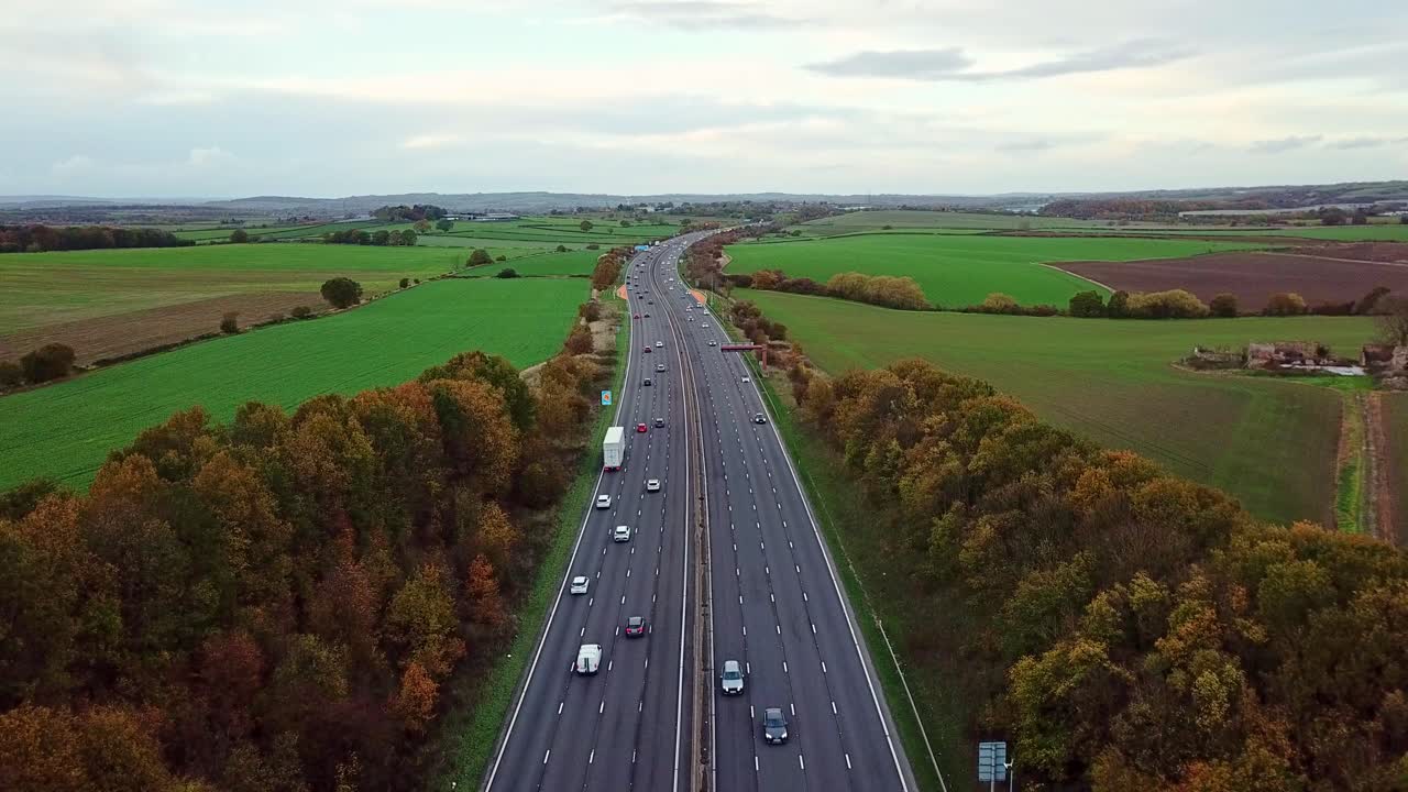 Drone shot above M1 Motorway in the UK around Junction 29 looking north