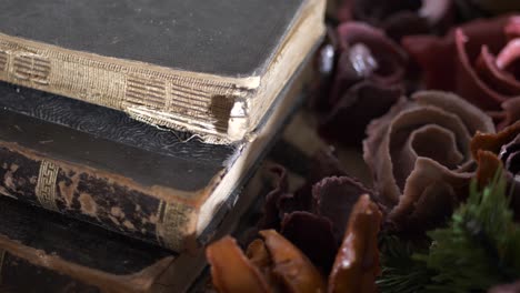 Occult-scene,-Ancient-Books-and-Flowers,-Close-Up