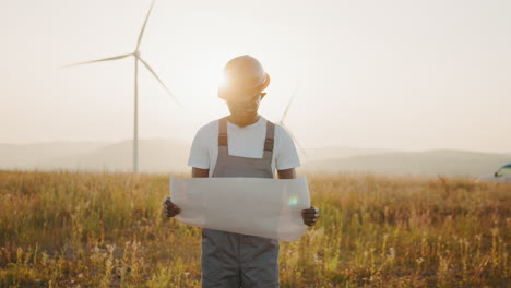 engineer reviewing wind turbine plans