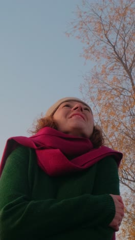 woman smiling outdoors in winter