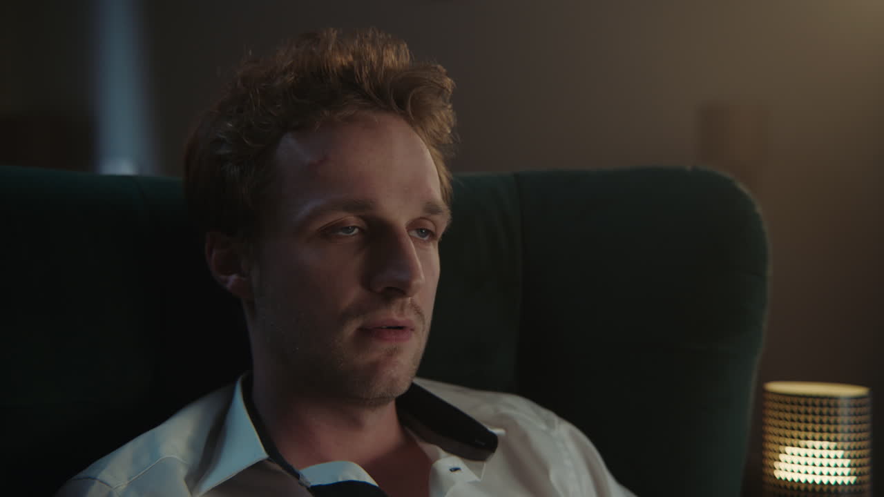 Man Sitting in Chair