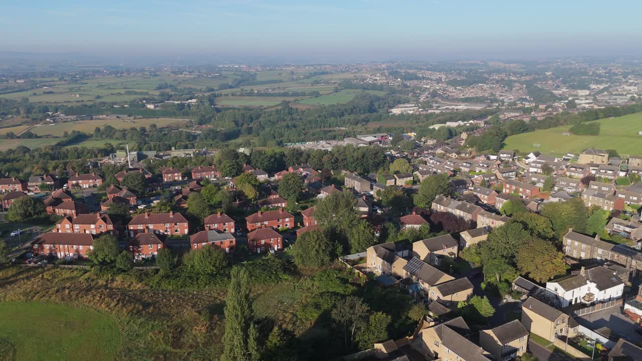 Gloomy Industrial housing in the UK, Council built red brick houses, Housing Moorside estate in the rundown Yorkshire town of Dewsbury, the country’s most infamous council estate