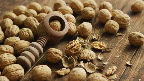 Walnuts and nutcracker on table