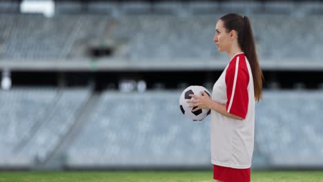 animation of caucasian female soccer player over stadium